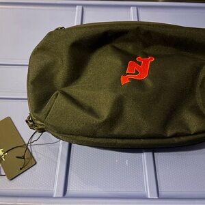 Mens black toiletry bag with NJ devils logo